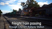 Freight train passing through Cha Am Railway Station