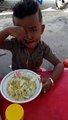 Chhaiya s'friend eating Cambodian noodle, funny kidq
