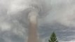 Swirling Tornado Passes Through Alberta Town
