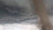 Huge Tornado Spins Through Alberta Town