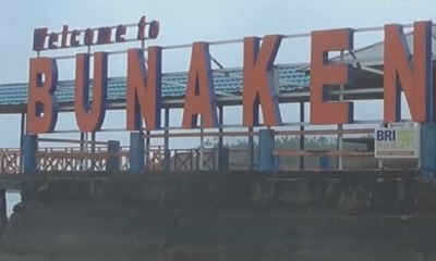 Warga Manado Bersihkan Bunaken