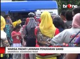 Warga Padati Sejumlah Layanan Penukaran Uang