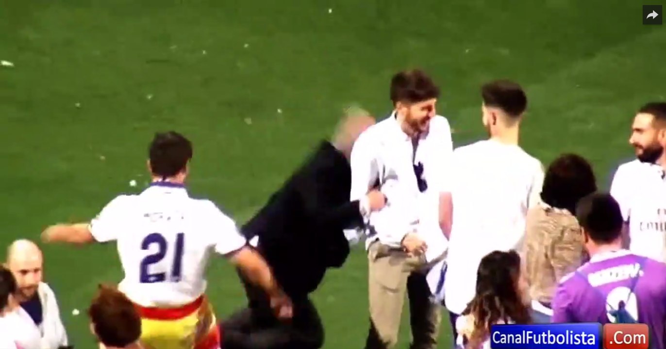 Morata trips down one of the Real Madrid officials during the celebrations