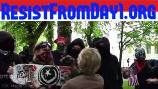 Antifa terrorists in Portland Oregon attack old lady.