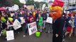 Demonstrators Hurl Water-Filled Condoms at Trump Effigy Amid Protest During Tillerson Visit