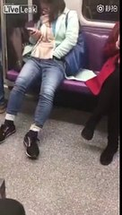 A girl puts her hand in the jeans in the metro A passenger resumes the absurd scene