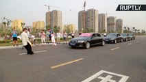 Balls of Steel! Tai Chi Master Pulls Four Cars with Bare Testicles