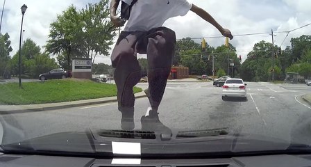 Atlanta Police Seek Man Who Jumped on Moving Car, Kicked in Windshield