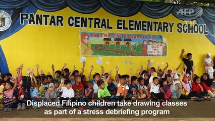 Displaced Philippine children draw their experience in Marawi