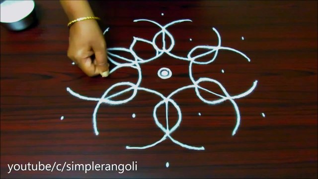 Flower muggulu designs with 7 to 4 dots __ latest flower kolam designs __ easy rangoli art designs