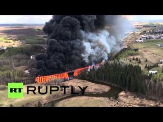 Huge fire destroys trestle bridge in Canada, police suspect arson (drone footage)