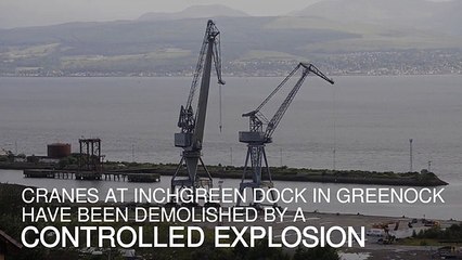 Cranes demolished by controlled explosion