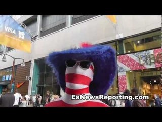 fans in olympic park looking like their flags