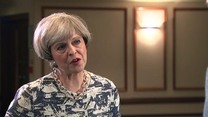 Theresa May says she will change human rights laws
