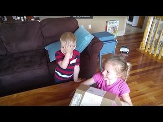 Download Video: Little Boy Less Than Impressed With Gender Reveal