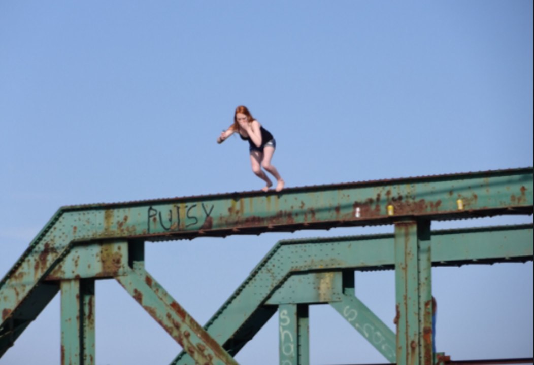 Jumping off a bridge into the Mira River with underwater cam