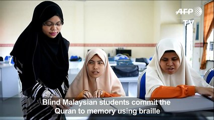 Blind Malaysian Muslims study Quran using Braille