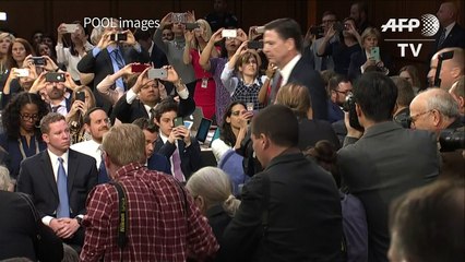 Comey says Trump request on Russia probe 'very disturbing'