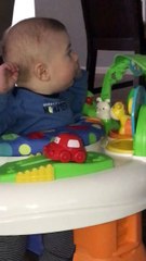 Bouncing Baby Boy Loves His Toys