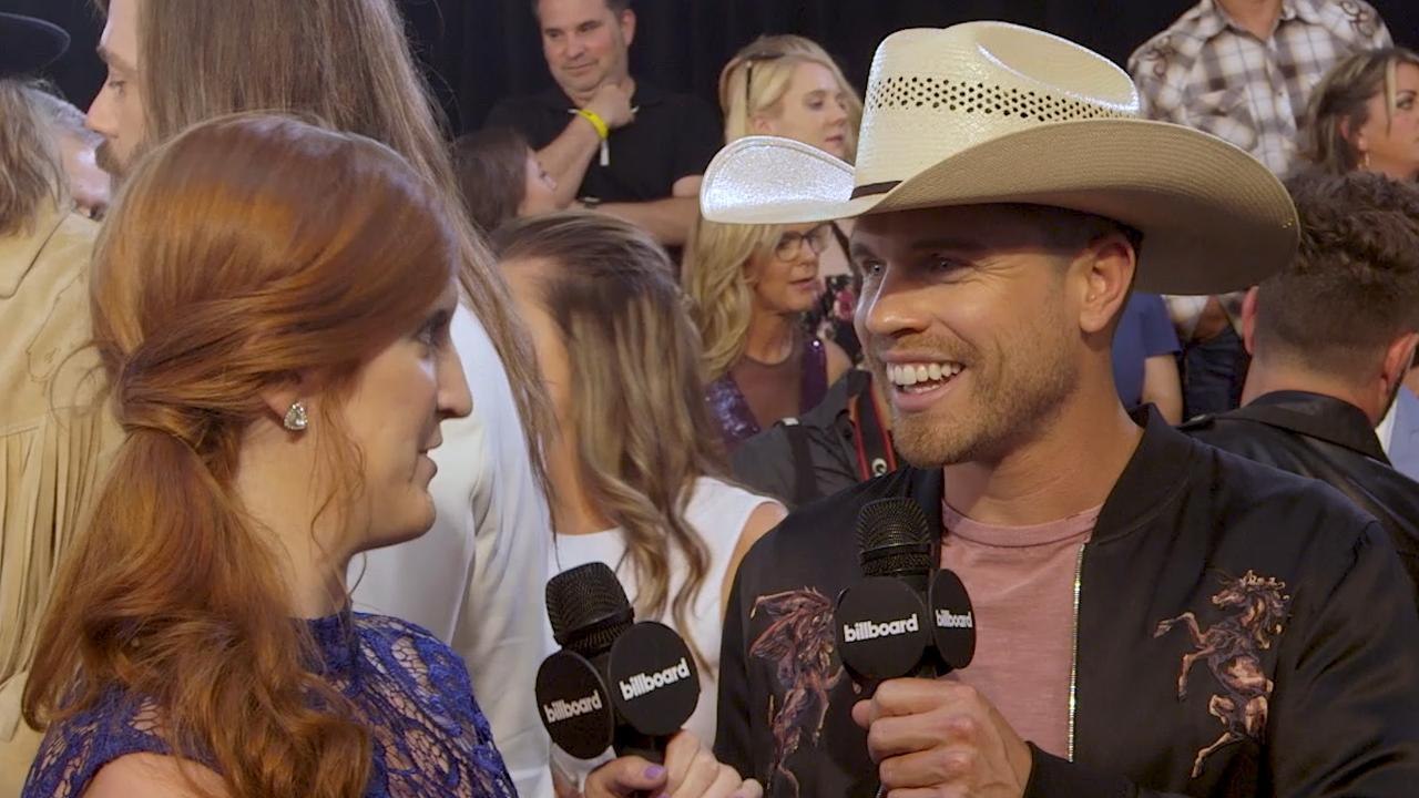 Dustin Lynch on Touring with Brad Paisley and Hearing "Small Town Boy" On the Radio | CMT Music Awards 2017
