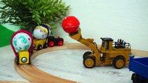 Trucks and loader for kids. Toys Cars - Surprise Eggs. Video for c