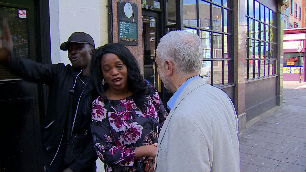 Labour leader Jeremy Corbyn greets reporters as he leaves home