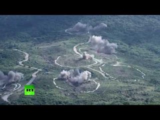 Apache & Black Hawk copters fire with machine guns during Taiwan military drills