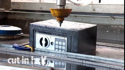 Personal fire safe cut in half with waterjet