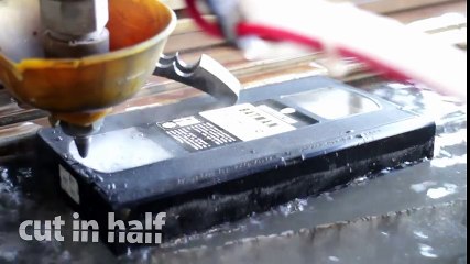 VHS cassette cut in half with waterjet