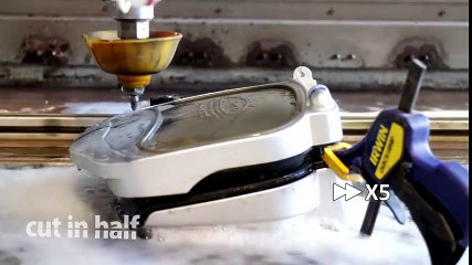 George Foreman grill cut in half with waterjet