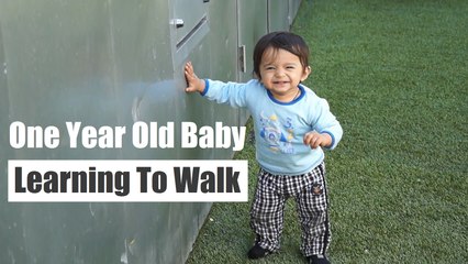 One Year Baby Learning To Walk