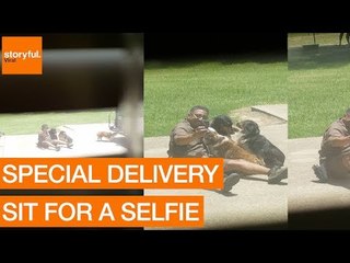 Cheerful UPS Deliveryman Poses For Selfie With Household Dogs