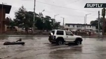 No Boat? No Lake? No Problem! Kids Pulled Through Flooded Streets on Inflatable Mattress by SUV