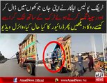 Pakistani Traffic Warden RISKS his LIFE to stop a fast moving truck