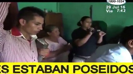 Possessed girl writhes and foams at the mouth as she undergoes an EXORCISM