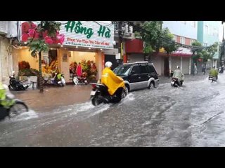 Rush-Hour Deluge Floods Streets in Hanoi