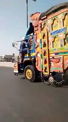 Pakistani Traffic Warden RISKS his LIFE to stop a fast moving truck