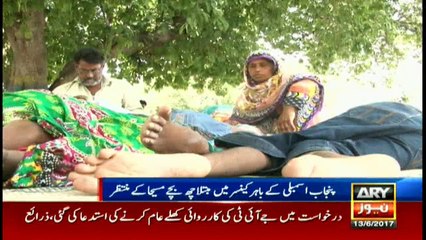 Cancer stricken children await a messiah outside the Parliament