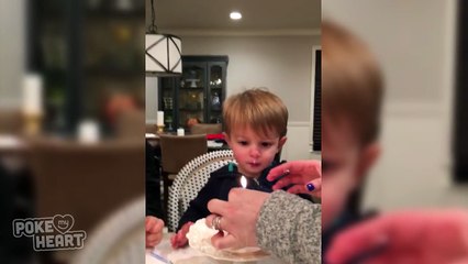 Little Boy's Birthday Candle Struggles
