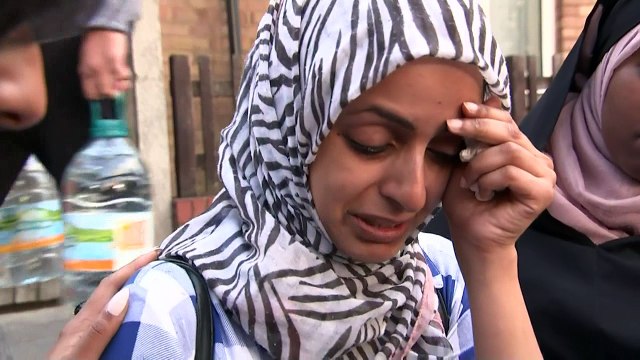 Woman cries for missing friend and two children after fire