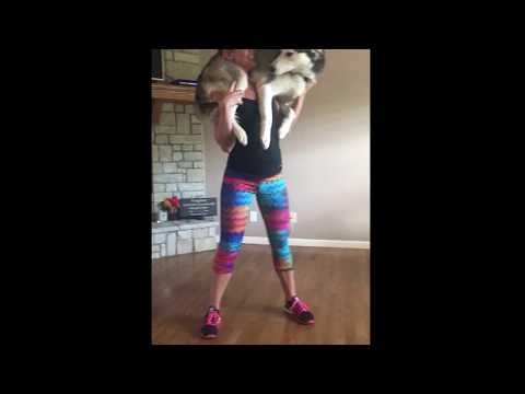 Woman Uses Helpful Husky for Weird Workout