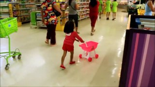 Baby Doing Grocery Shopping at Supermarket with Toy Shopping Cart - Donna The