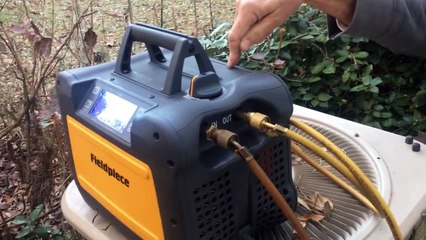 Fieldpiece MR45 recovery unit recovering refrigerant from an air conditione
