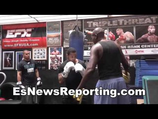 david thomas and coach larry working on head movement EsNews