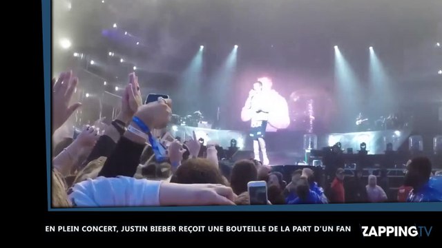 Justin Bieber : Un fan lui jette une bouteille d’eau au visage en plein concert (vidéo)