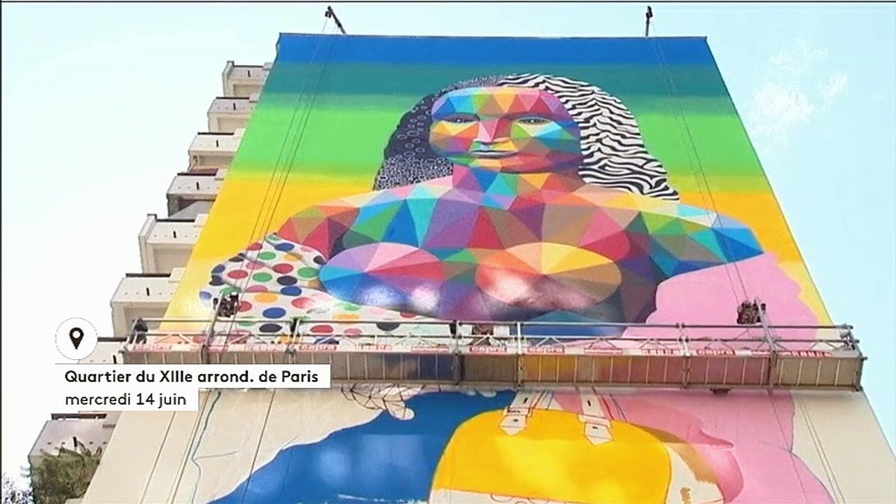 Un street-artist peint une Joconde géante sur u...