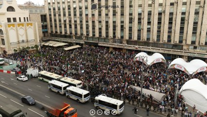 Идентификация человека с гигапиксельной панорамы акции сторонников Навального в Москве