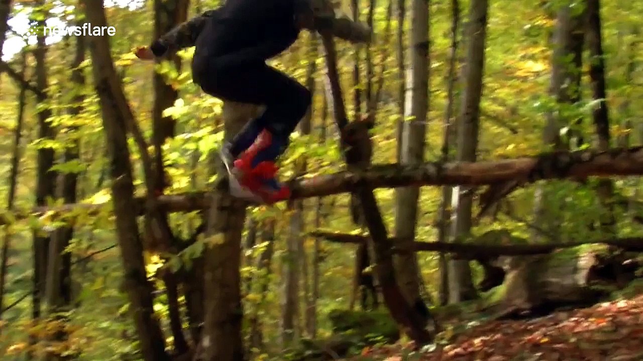 Skiing and snowboarding in a forest with no snow looks amazing