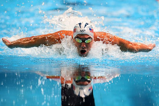 Michael Phelps is going to race a great white shark for Shark Week