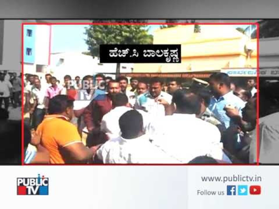 Clash between JDS and Congress workers during evacuation of market at Magadi